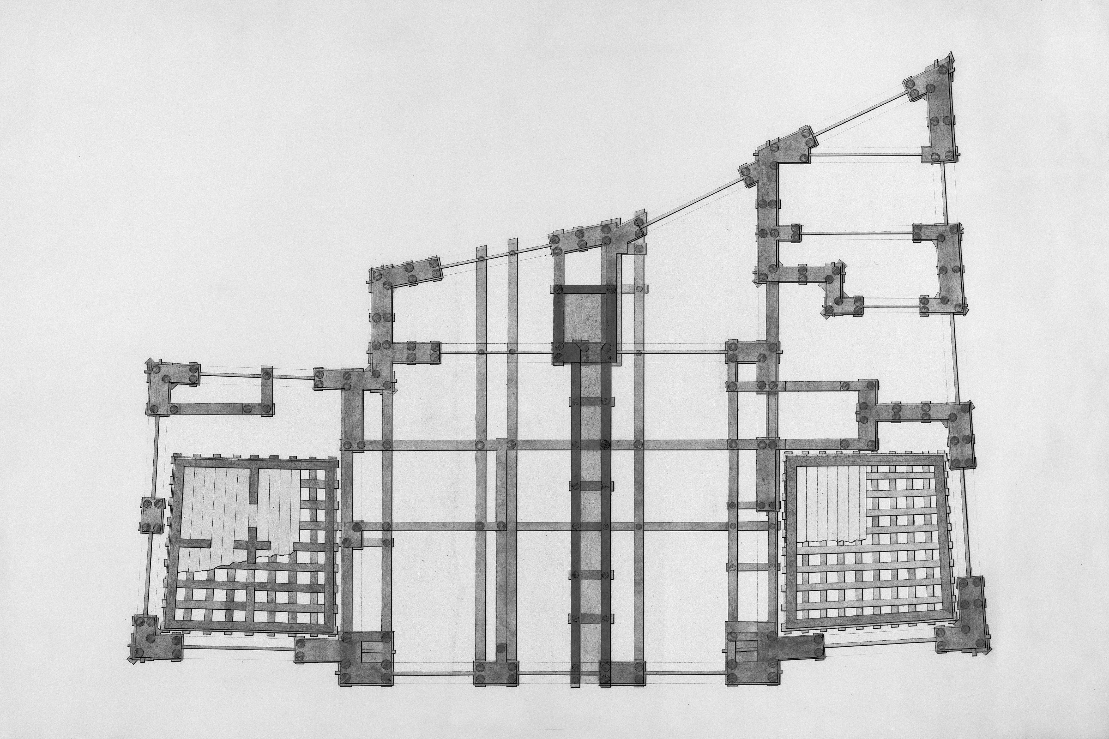 組み込み開発チームがディスカッションを行い、ホワイトボードにシステム構成図を描きながら意見を出し合う様子を表すリアルなイラスト